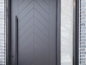 Modern 8 foot smooth skin Chevron door with sidelite and transom