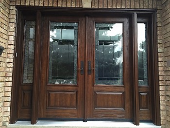 Exterior fibreglass door installation with glass detailing by FORHOMES Ltd.