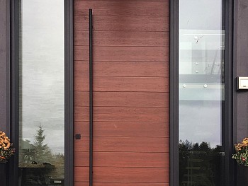 Modern 8 foot textured fiberglass door with horizontal grooves and derect set clear sidelites