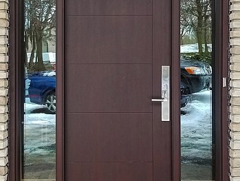 Modern 7 foot textured fiberglass door with shadow groovs and clear sidelites