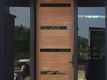 Modern fiberglass door with flush mount clear glass and clear sidelites