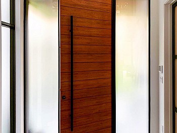 Modern 8 foot Oak panel with horizontal grooves and derect set satin etch sidelites - Inside view