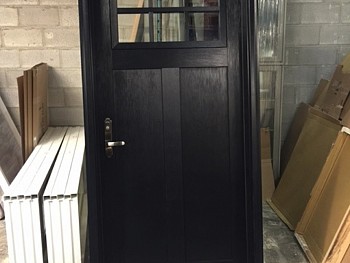 Fiberglass door with top panel cut out just out of production