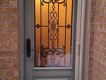 Fiberglass door with beautiful custom glass/ wrought iron insert