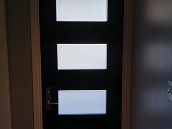 Dark fiberglass door with Quadruple inserts interior view