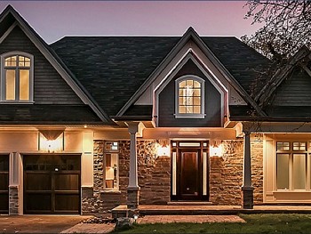 Model home in Oakville with casement windows & entry door installation.