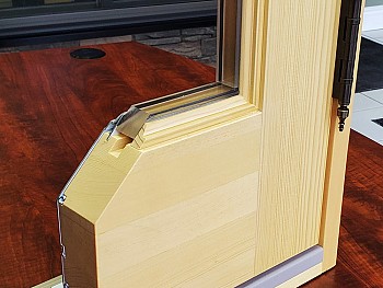 017 - Wood door with extruded aluminum cladding