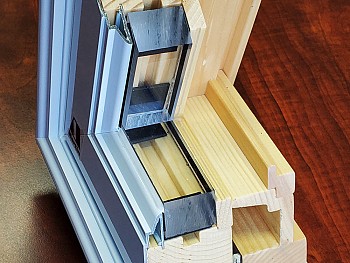 002 - Wood window with extruded aluminum cladding - retrofit application