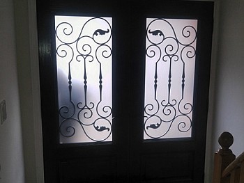 Fiberglass Double Door with Wrought Iron Inserts and privacy glass