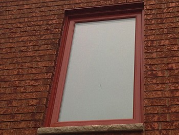 Custom painted red replacement window in Oakville by Forhomes