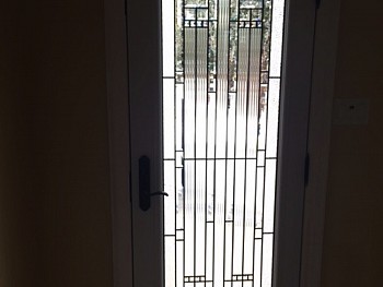 Steel door with custom window design