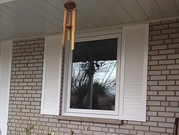 Custom casement replacement window and vinyl shutters Caledon